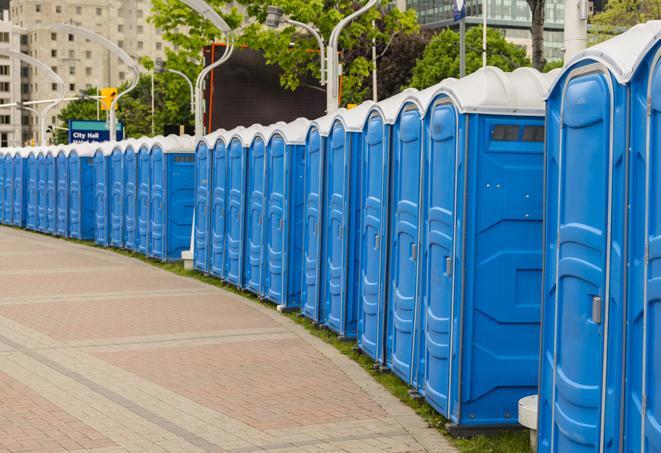 a row of portable restrooms at a fairground, offering visitors a clean and hassle-free experience in ladson